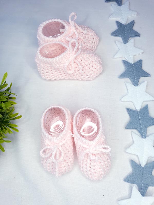 Pink knitted booties