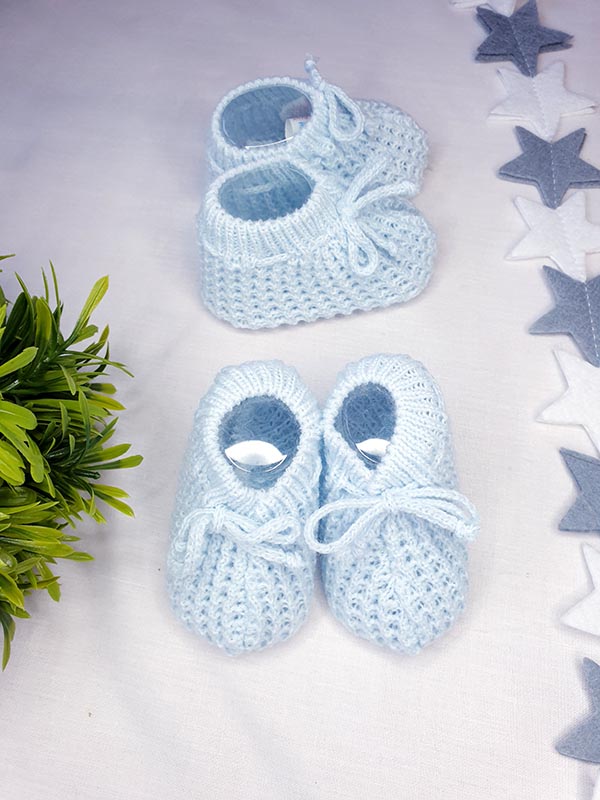 Pale blue knitted booties